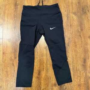 Nike capri legging in size small, pocket in the back and waist string